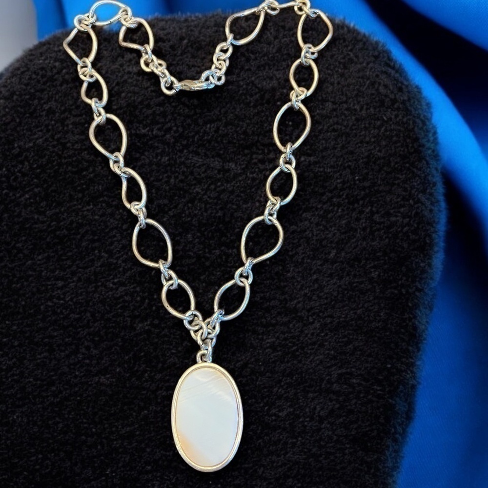 AVON Pendant Necklace- Oval Mother Of Pearl in Silver Tone Bezel on Large Silver